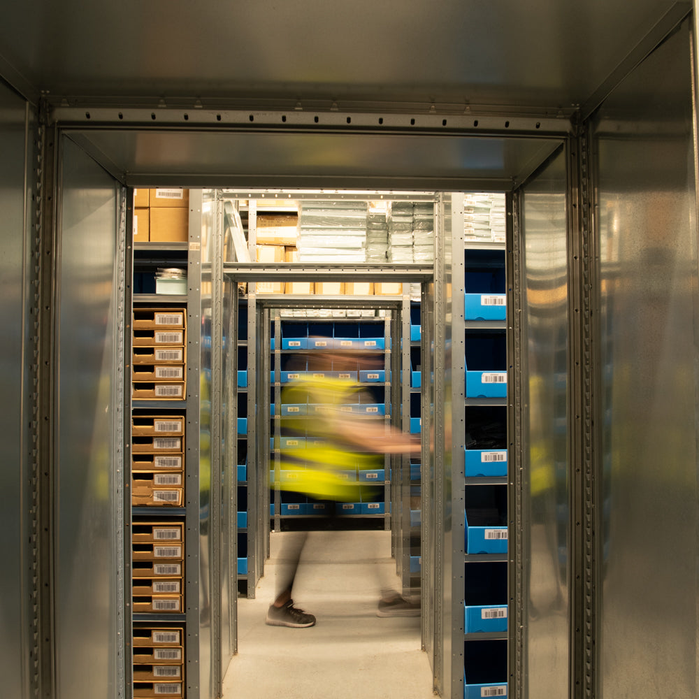 Team Member with Motion Blur Picking Orders in Warehouse 2